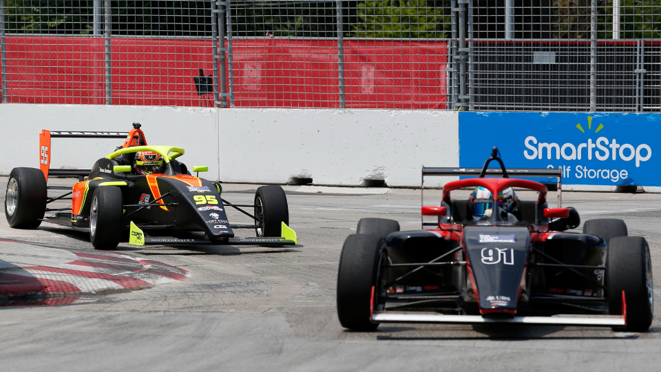 Indy Lights car through turn 1 at the Honda Indy Toronto