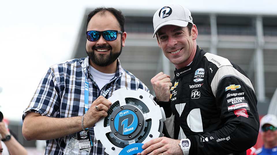Simon Pagenaud with the P1 award at the Honda Indy Toronto